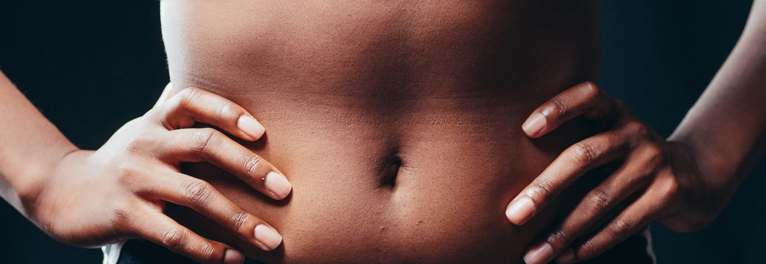 Belly with hands on hips Blog Image