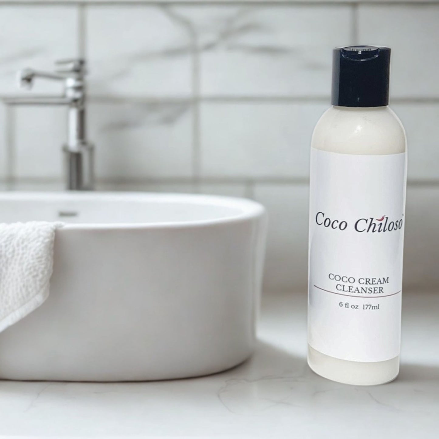 Coco Cream Cleanser near a sink